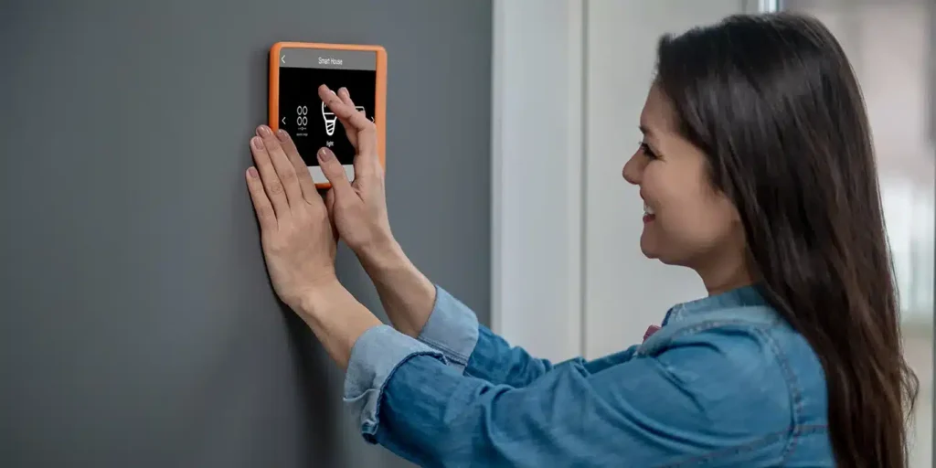 a woman touching a touch screen