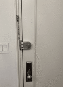 a door with a lock and a key