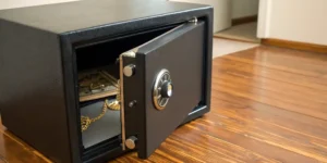A person opening a Sentry safe using the 3 number combination dial.