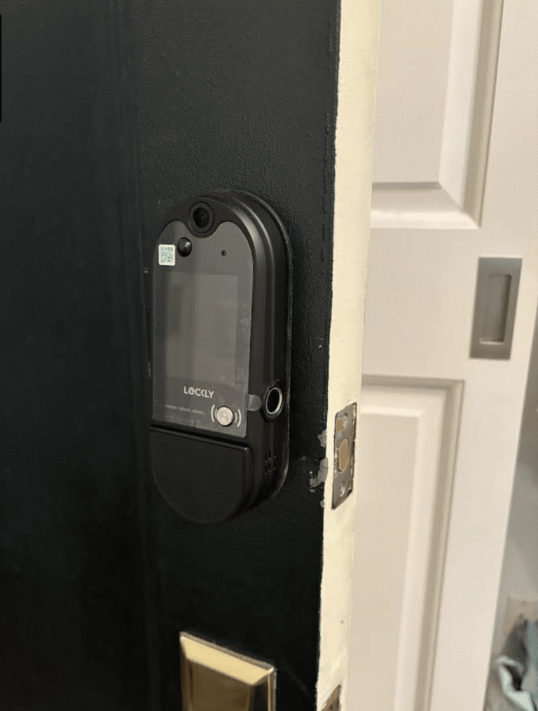 a door lock with a screen on it