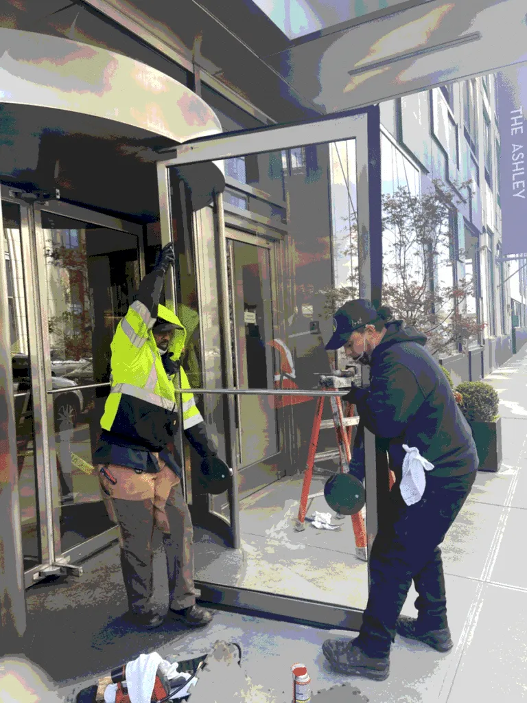 Revolving door installation by Golden Key Locksmith NYC