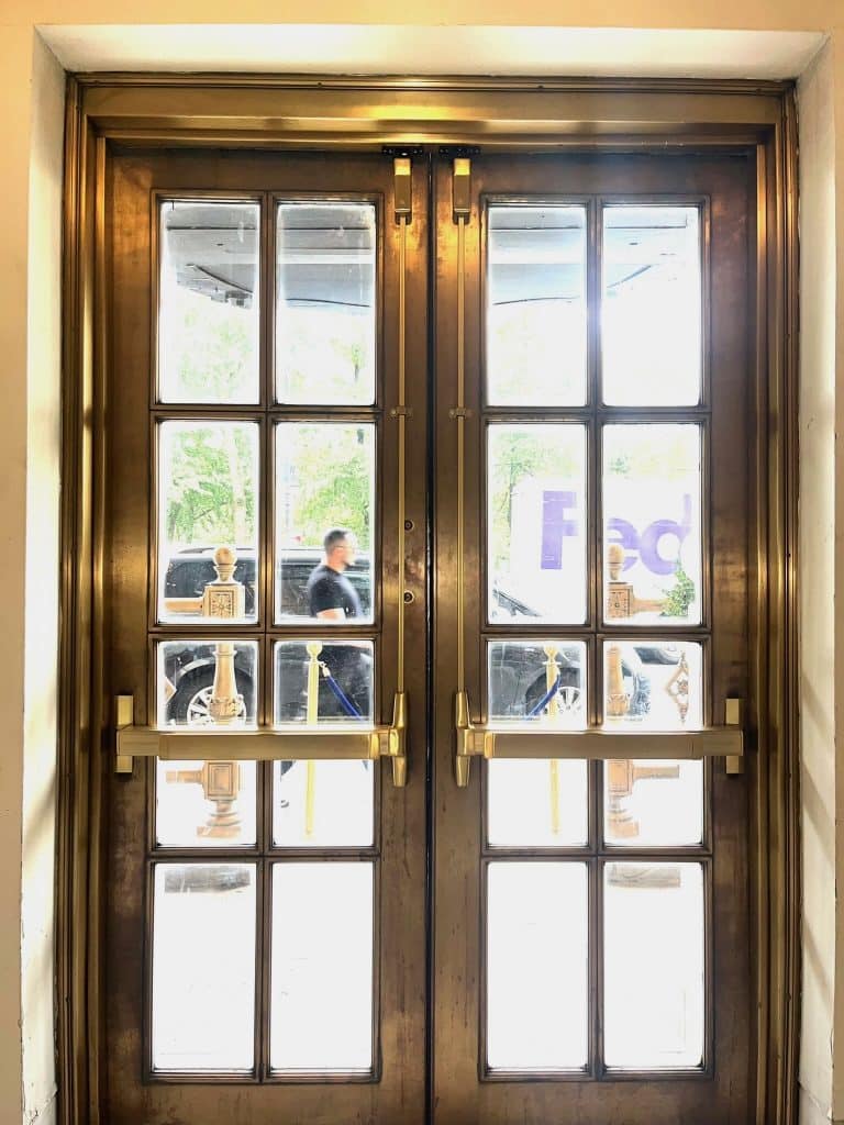 Double glass doors with reflections