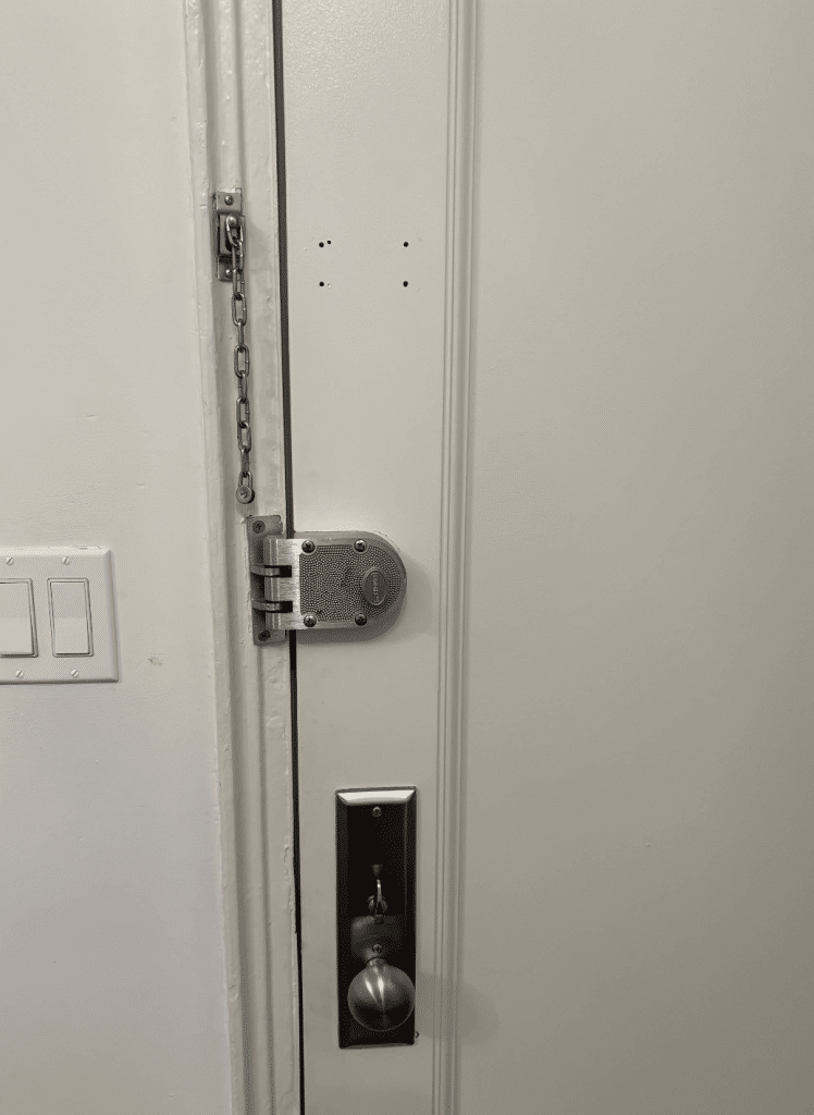 a door with a lock and a key