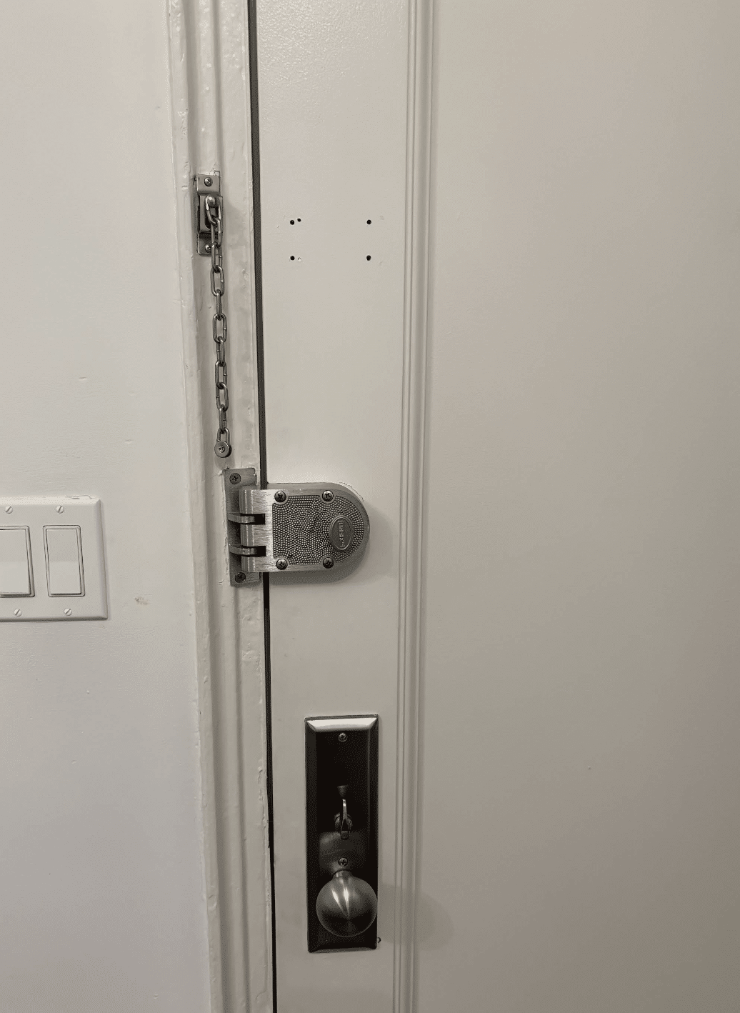 a door with a lock and a key