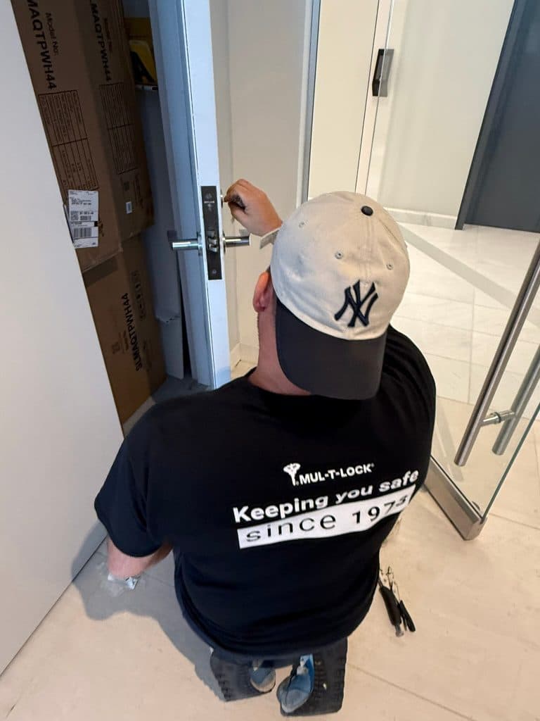 Trusted local Golden Key Locksmith NYC technician installing an access control system near a Upper East Side residence in SoHo, Manhattan NYC